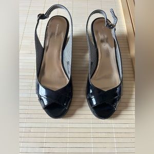 Tommy Hilfiger Chavella black leather wedge 
Never worn 
Size:8.5